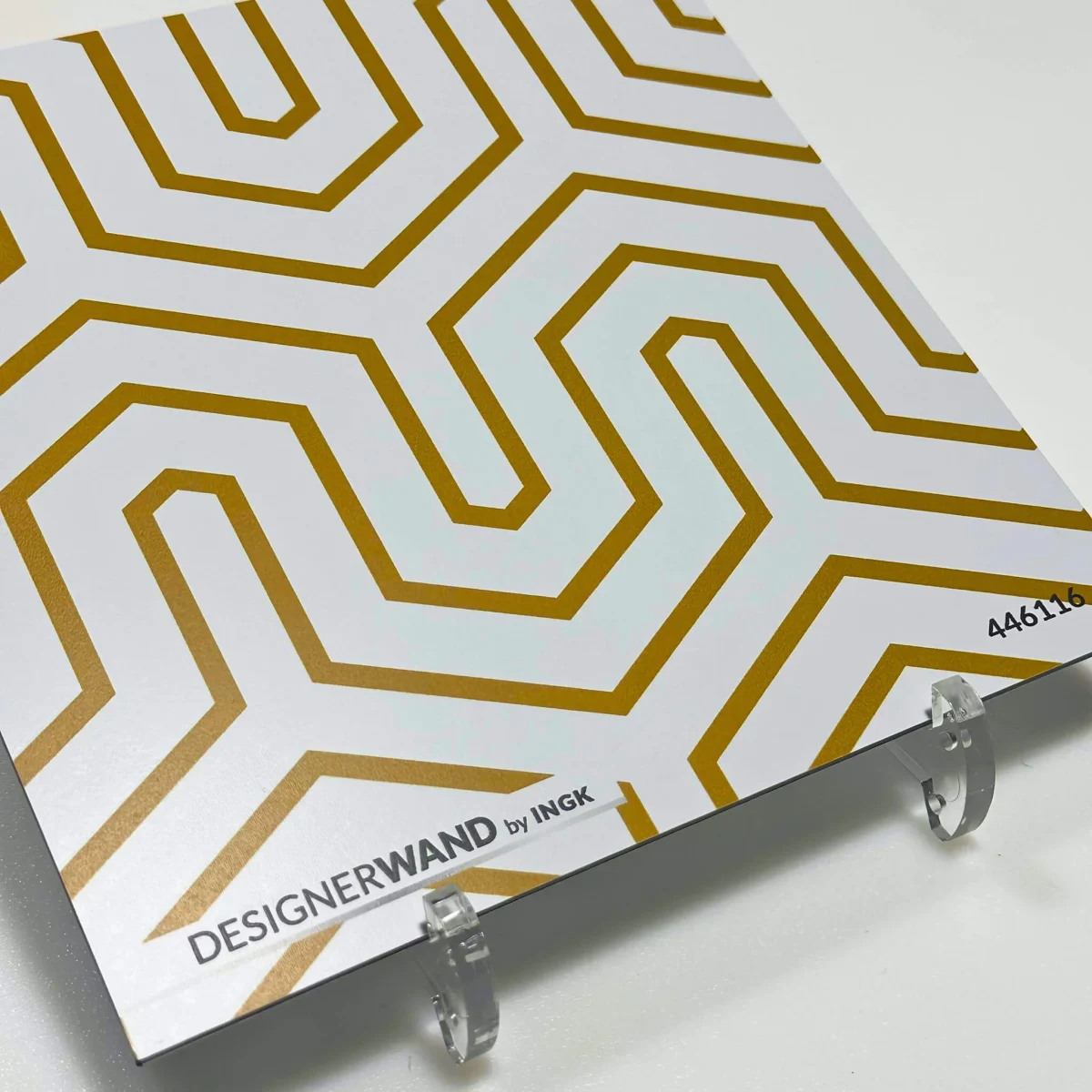 Backsplash sample Andalous Gold with luxurious geometric maze pattern in gold tones on white background