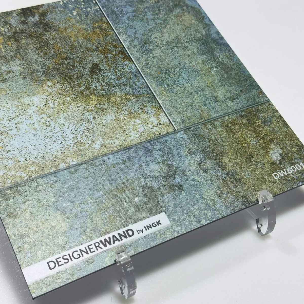 Sample of Industrial Tile backsplash DW6001 with weathered slabs in blue-green and rust brown
