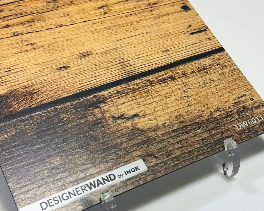 Sample of wooden backsplash DW6011 with broad rustic planks and visible knot holes in warm brown tones.