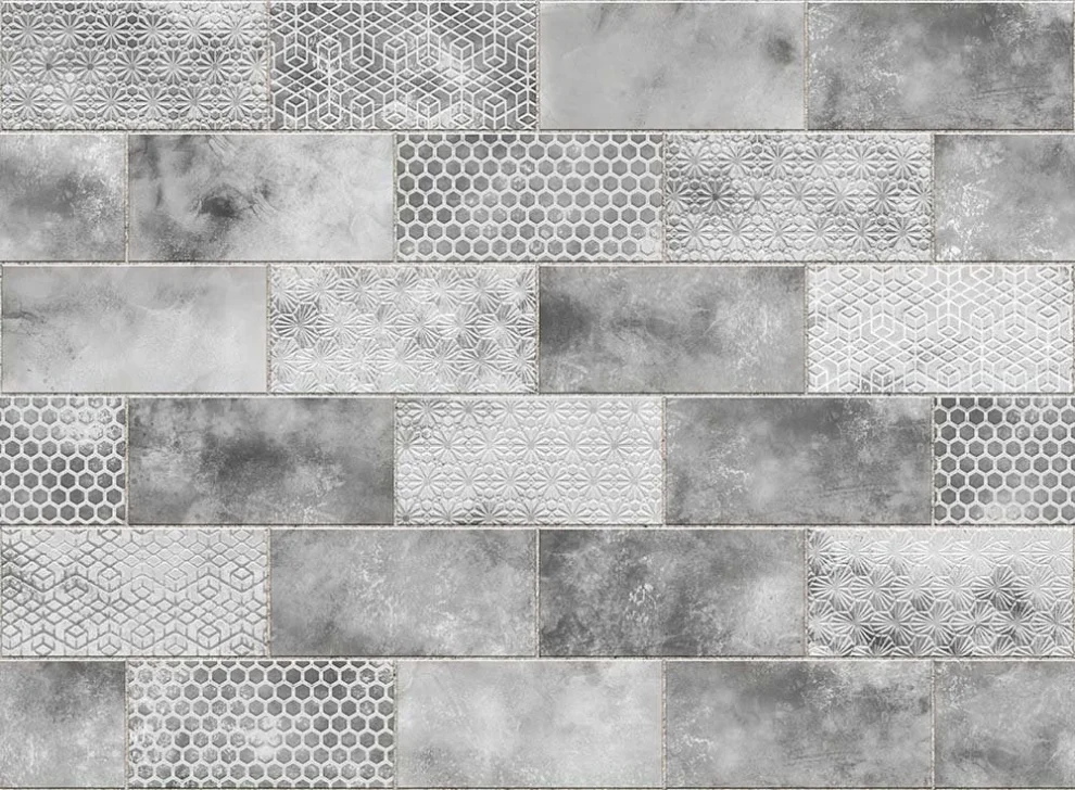 Grijze patroontegel spatwand DW8550 met geometrische designs in licht- en donkergrijze tinten