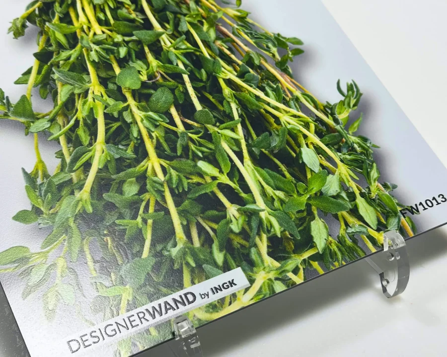 Sample of backsplash FW1013 with hanging bunches of fresh herbs on a light background