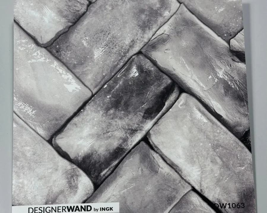Staal van grijze visgraat spatwand DW1063 met antraciet en leisteengrijze herringbone tegels.