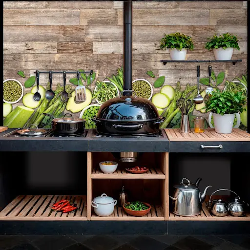 Buitenkeuken met een spatwand op maat