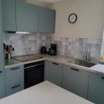 Antique Tile Backsplash – Ghost in a customer's kitchen