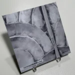 DW7611 sample, 20x20 cm, metallic leaf pattern with arches in cool grey